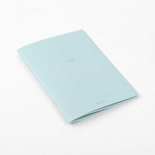 Single Midori A5 blue notebook with colour dot grid pages on a plain background.