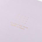 Single Midori A5 purple notebook.