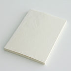 Single MD Notebook A5 with blank pages on a plain background.