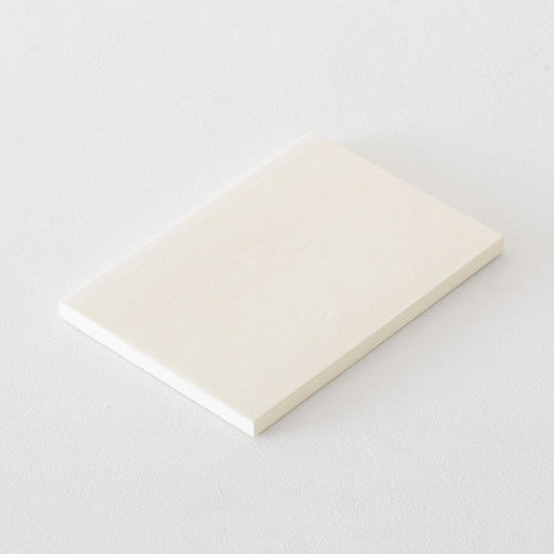 Single MD Notebook A5 with blank pages on a plain background.