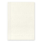 15th anniversary limited edition MD Notebook with embossed Holly Wales design, on a white background.