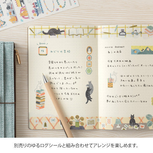 Single Midori B6 Yuru Log Book Cat edition, open on table showing possible uses.