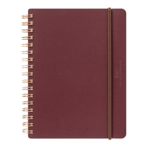 Dark Red MD Midori notebook with gold wire binding on a white background