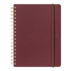 Dark Red MD Midori notebook with gold wire binding on a white background