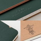 Dark Green MD Midori notebook on a white background.