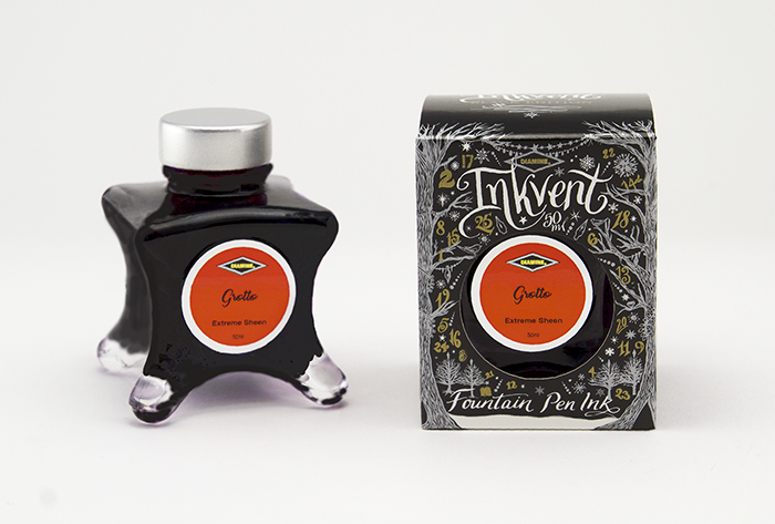 Diamine Grotto fountain pen ink bottle and packaging on a white background.