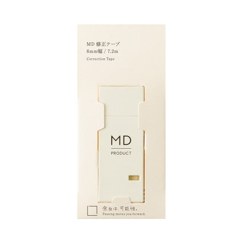 MD Paper company product "writing correction tape" in cream colour on white background.
