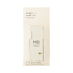 MD Paper company product "writing correction tape" in cream colour on white background.