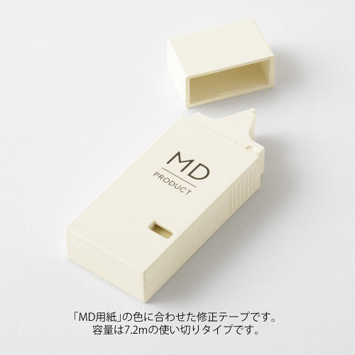 MD Paper company product "writing correction tape" in cream colour on white background.