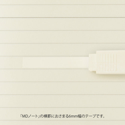 MD Paper company product "writing correction tape" in cream colour being used on MD Paper.