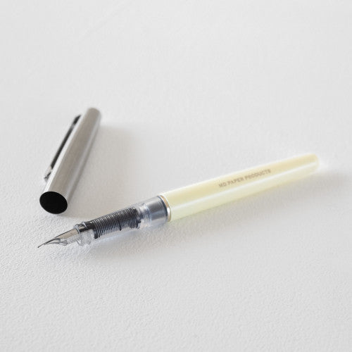 MD Fountain pen with cap off on a white background.