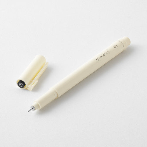 MD drawing pen with cap off on a white background.