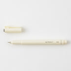 MD drawing pen with cap off on a white background.