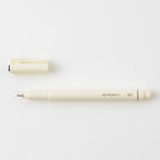 MD drawing pen with cap off on a white background.