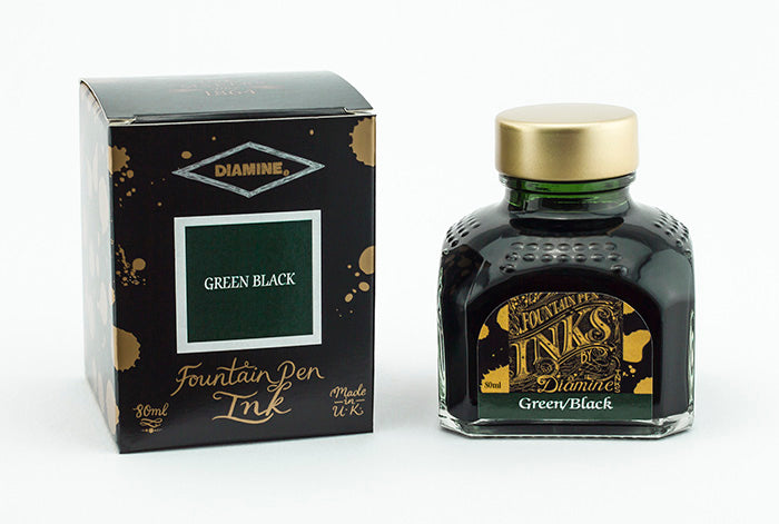 A glass bottle of 80ml Diamine Green Black fountain pen ink next to its packaging box, in front of a white background.