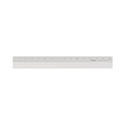 Single Midori silver aluminium ruler on a plain background.
