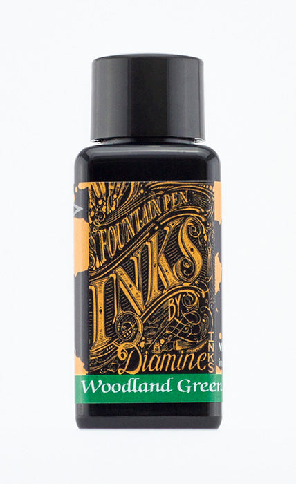 A bottle of 30ml Diamine Woodland Green fountain pen ink, in front of a white background.