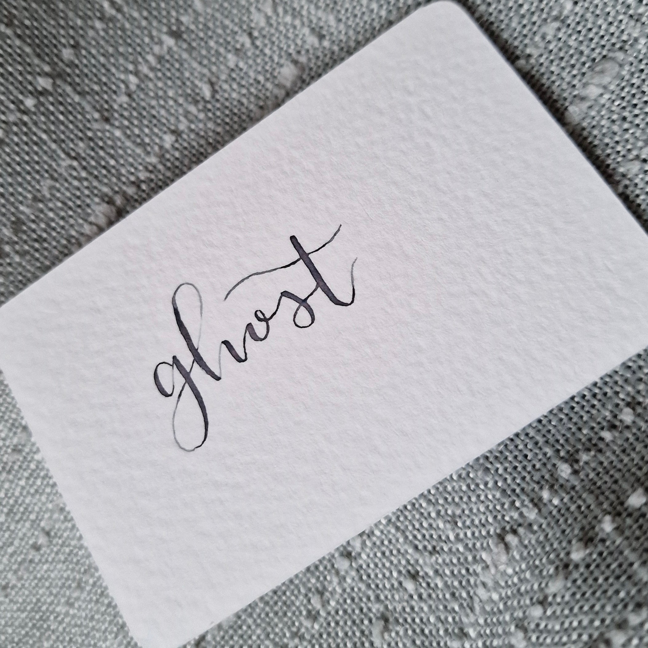 A colour writing swatch of Diamine Ghost fountain pen ink.