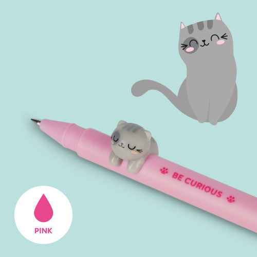 Single Legami Kitty Gel Pen with pink ink on a mint green background next to cartoon image of cat.