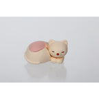 Single Iwako Sleeping Cat Eraser in Pastel Orange.
