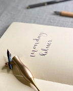 A colour writing swatch of Diamine Ruby Blues sheening fountain pen ink.