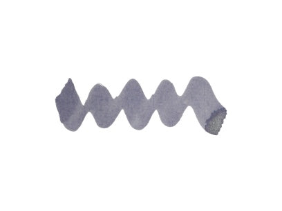 Wavy pale purple grey line on a white background. Diamine Icy Lilac fountain pen ink colour swatch.