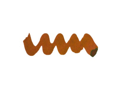 Wavy orange brown line on a white background. Diamine Sleigh Ride fountain pen ink colour swatch.