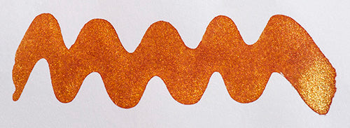 A colour swatch of Diamine Caramel Sparkle fountain pen ink.