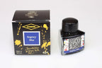A glass bottle of 40ml Diamine 150th Anniversary Regency Blue fountain pen ink next to packaging box, in front of a white background.