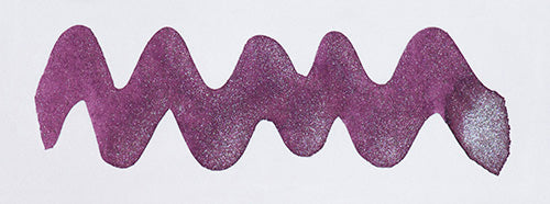 A colour swatch of Diamine Frosted Orchid shimmering fountain pen ink.