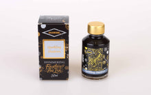 Load image into Gallery viewer, A glass bottle of 50ml Diamine Sparkling Shadows shimmering fountain pen ink next to its packaging box, in front of a white background.
